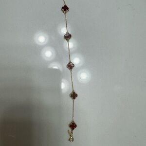 Radiant Gold and Red Bracelet with Intricate Design
6.5 inches 18k real gold